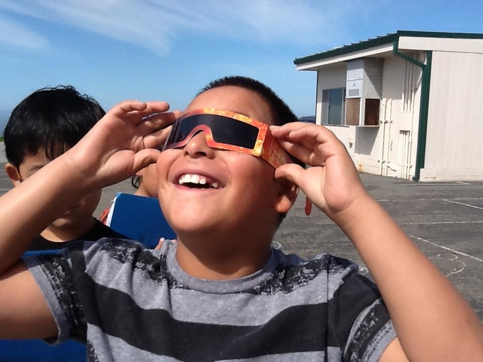 boy with solar glasses